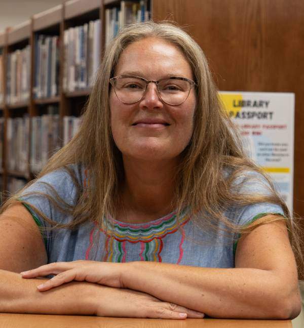 the library Executive Director is Brice Bush.